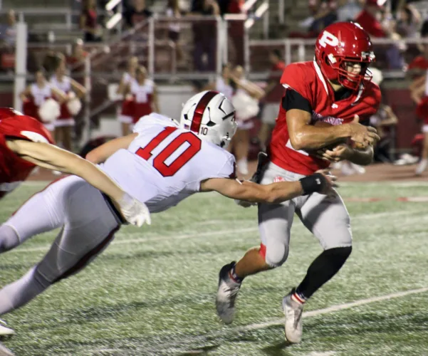 In the win column: Big Reds hold on to beat Hurricane, 21-20